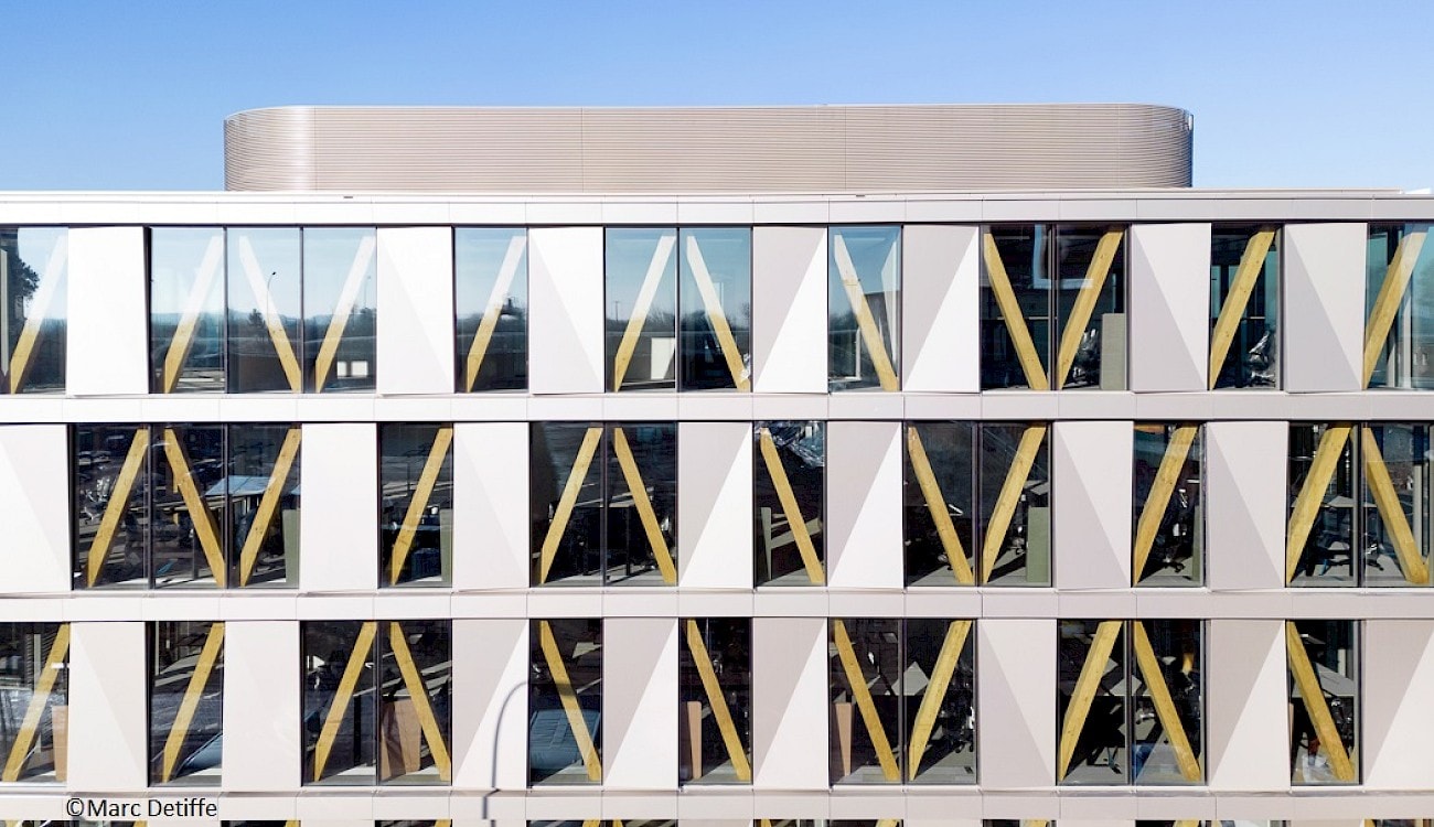 BPI Real Estate & IKO Real Estate successfully deliver WOODEN building and sell the participation in Wooden to ACRON